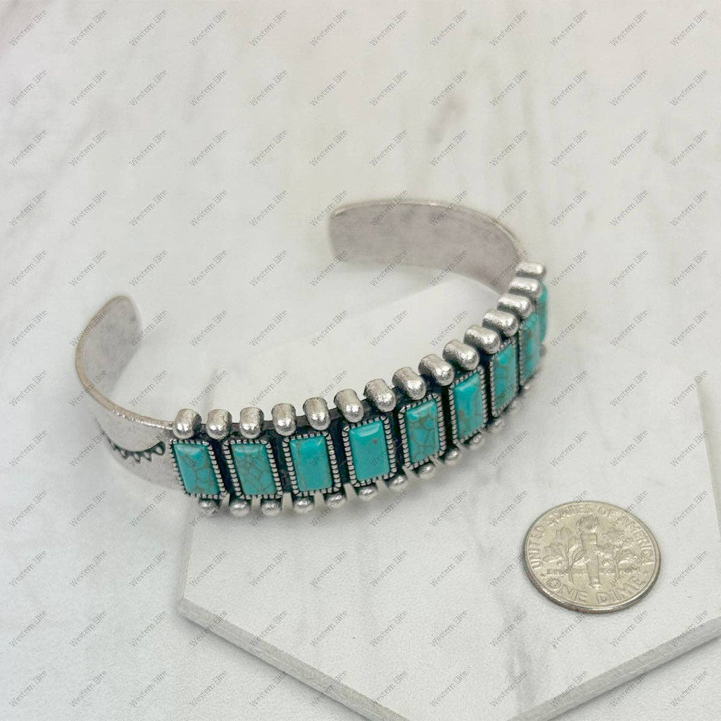 Silver metal with blue turquoise stone bangle