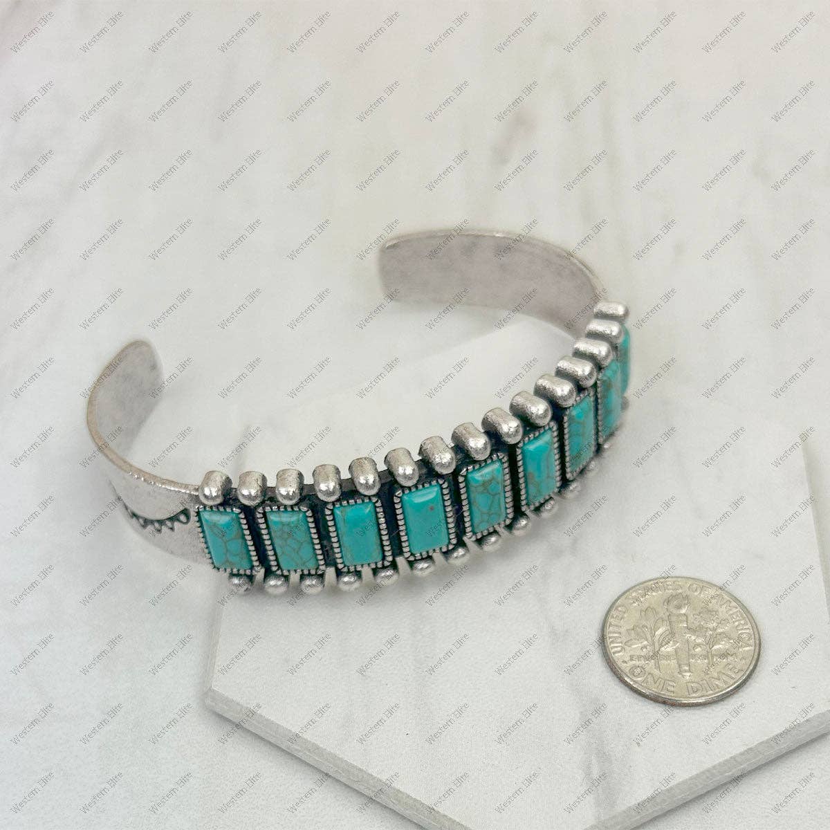 Silver metal with blue turquoise stone bangle