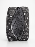 A black and white patterned zippered pouch shown open against a clean white background.