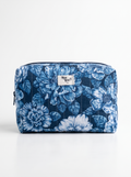 A rectangular zippered cosmetic pouch by Mesa Rose Co featuring a blue and white floral print, set against a plain white background.